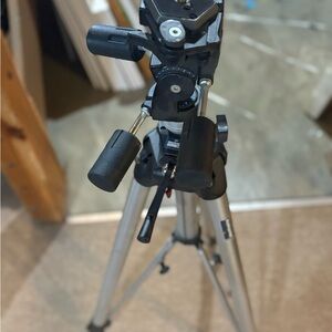 Black and Silver Camera Tripod